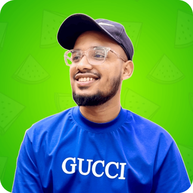 Smiling man with a black cap and clear glasses wearing a blue Gucci shirt against a green background with watermelon illustrations.