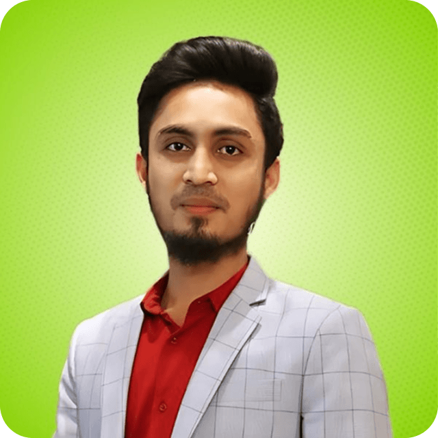 Portrait of a young man with neatly styled hair, beard, wearing a light gray checkered blazer over a red shirt against a green background.