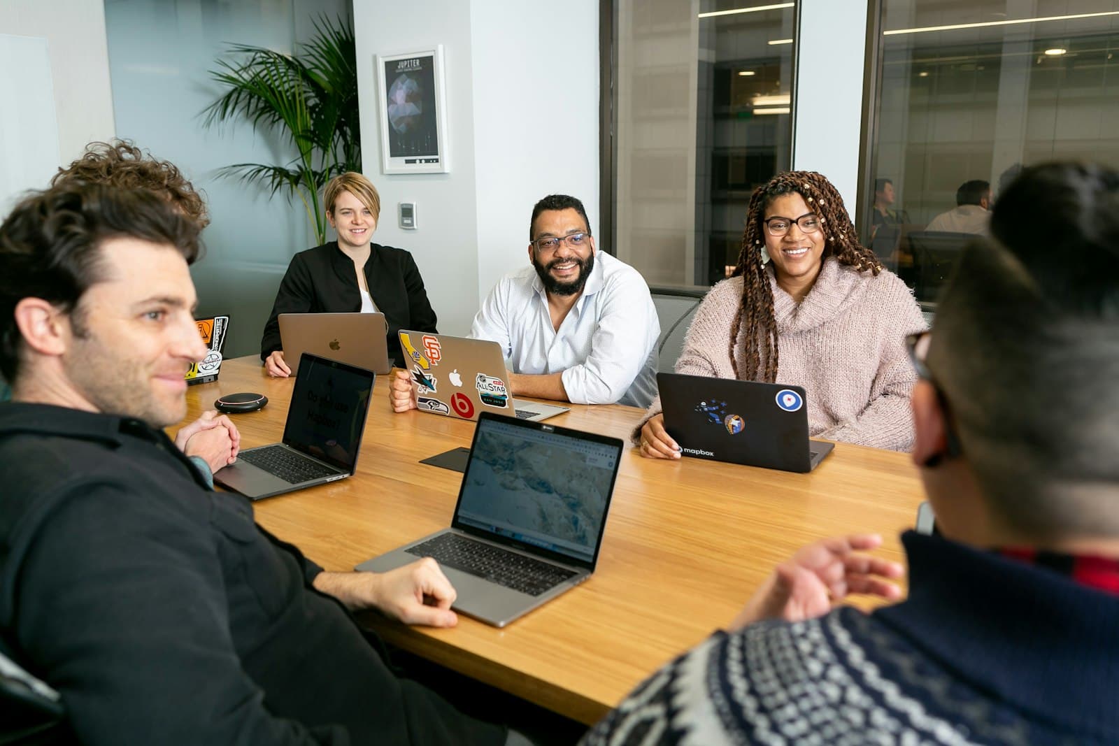 Founders and the Cozmiq team in a kickoff meeting
