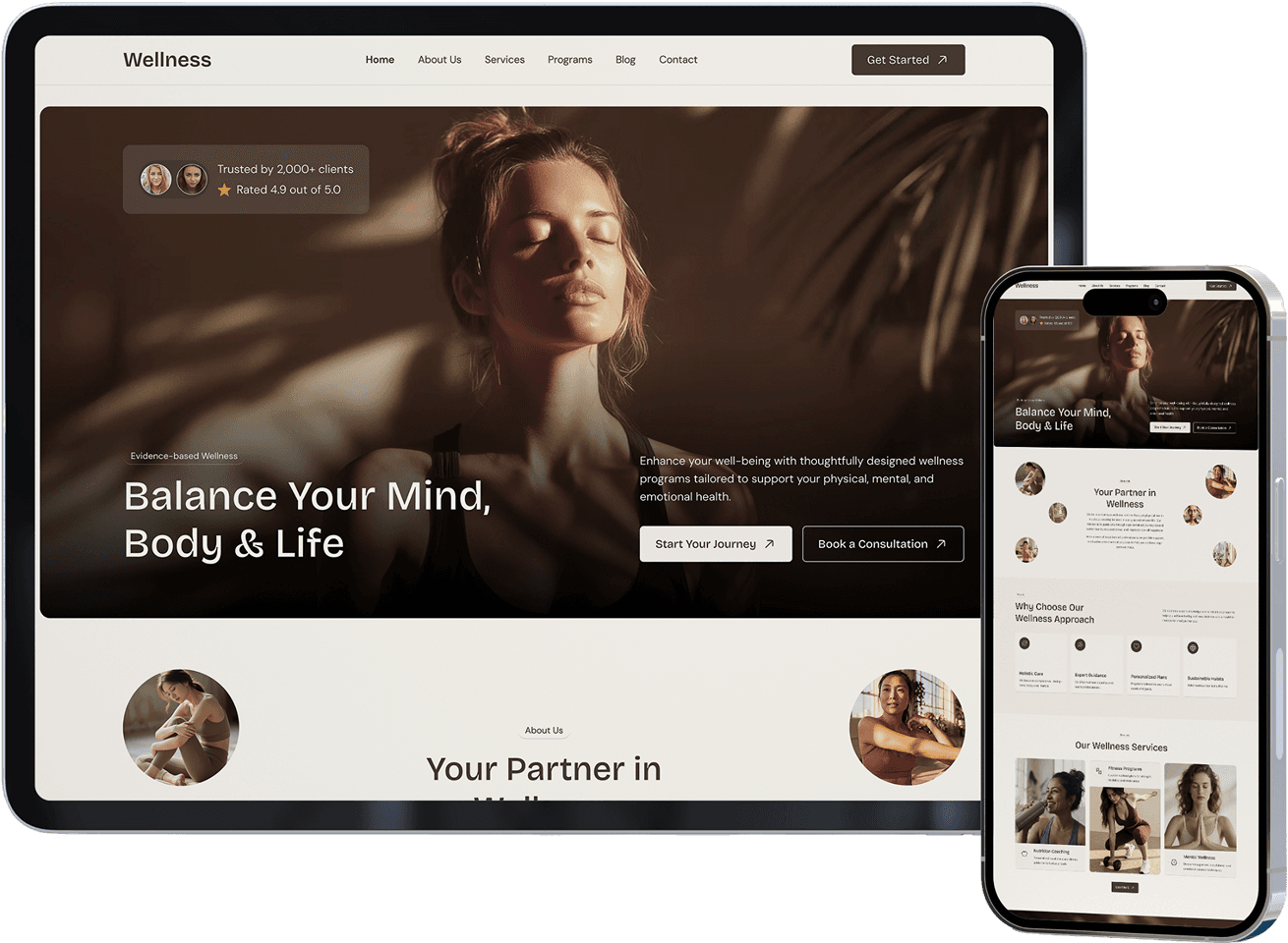 A custom-built website shown across tablet and mobile devices